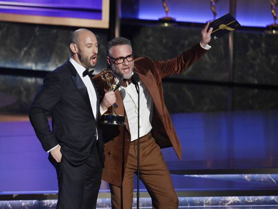 Evan Goldberg (L) and Seth Rogen accept the Outstanding Directing For a Comedy Series award for The Studio onstage at the 77th annual Primetime Emmy Awards at the Peacock Theater in Los Angeles on Sunday, September 14, 2025.  LAP20250914914 JIMxRUYMEN