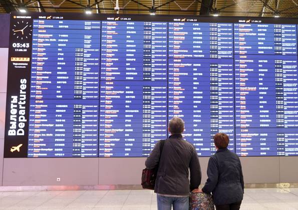 RUSSIA, MOSCOW REGION - SEPTEMBER 17, 2025: Travelers read a flight information display board as an Aeroflot flight prepares to depart from Sheremetyevo International Airport to Krasnodar. On 11 September 2025, Krasnodar International Airport resumed operations, with the first civil flight since 2022 expected to land there on September 17. Sofya Sandurskaya TASS  84063506