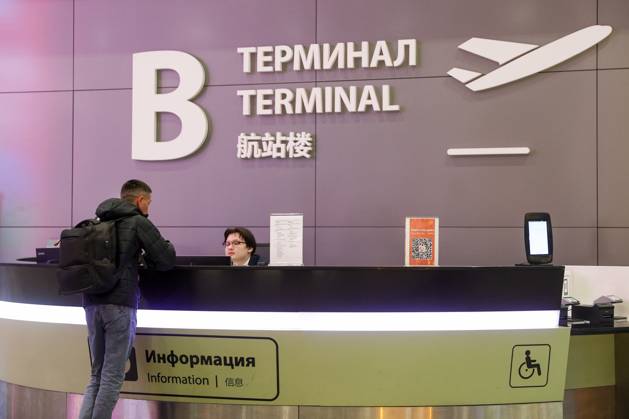 RUSSIA, MOSCOW REGION - SEPTEMBER 17, 2025: A man approaches an information desk at Sheremetyevo International Airport. Sofya Sandurskaya TASS  84064005