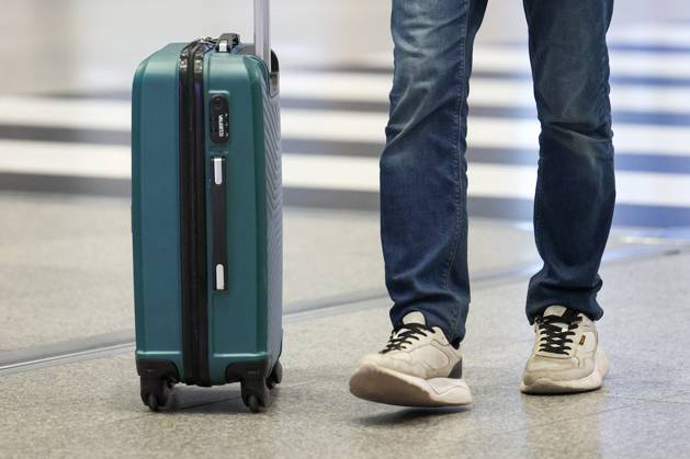 RUSSIA, MOSCOW REGION - SEPTEMBER 17, 2025: A man wheels along his suitcase at Sheremetyevo International Airport. Sofya Sandurskaya TASS  84063938