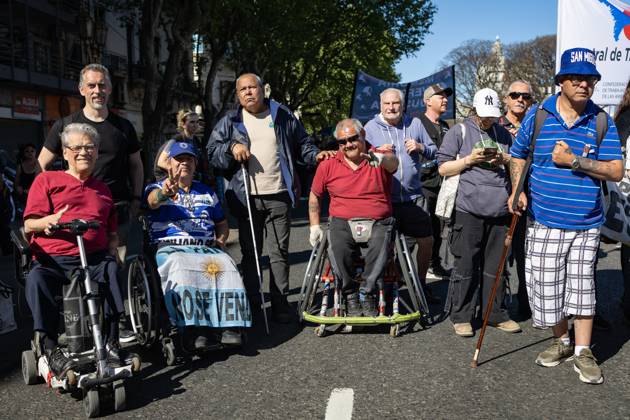 October 1, 2025, Buenos Aires, Buenos Aires, Argentina: Disabled citizens and pensioners pose for the camera during a retireesâ€⠢ march against President Javier Mileiâ€⠢s austerity measures. Buenos Aires Argentina - ZUMAp265 20251001_zip_p265_003 Copyright: xDelfinaxCorberaxPix