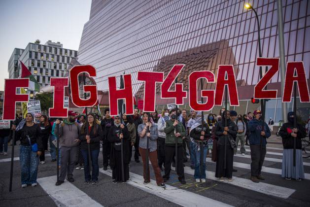 October 7, 2025, Minneapolis, Minnesota, United States: Protestors carry giant letters that spell out Ã¢â‚¬oeFight 4 Gaza.Ã¢â‚¬Â On October 7, 2025, pro-Palestinian protestors gathered at the Diana E. Murphy Federal Courthouse in Minneapolis, Minnesota. They gathered on the two-year anniversary of the start of the genocide in Gaza, and to march for Palestinian liberation. Minneapolis United States - ZUMAp202 20251007_zip_p202_011 Copyright: xJamesxPetermeierx