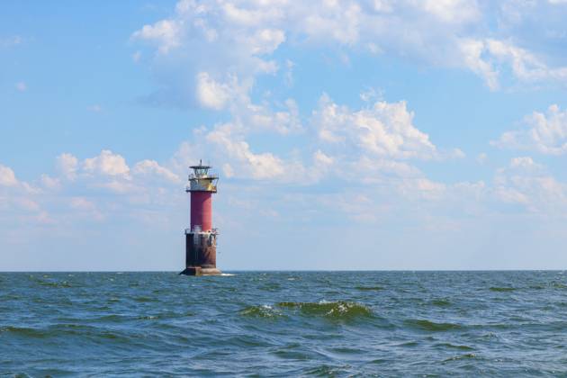 A lighthouse in the Baltic Sea in the Gulf of Finland near Tallinn, Estonia. Blue morning sky, clouds, waves, sea. Banner with copy space A lighthouse in the Baltic Sea in the Gulf of Finland near Tallinn, Estonia. Blue morning sky, clouds, waves, sea. Banner with copy space, 60849052.jpg RECORD DATE NOT STATED