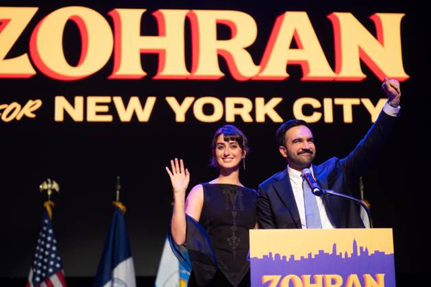 Mayor-elect Zohran Mamdani and his wife Rama Duwaji greet supporters at an election night watch party after winning the New York City mayoral race on Tuesday, November 4, 2025, at the Brooklyn Paramount Theater in New York City.  NYP20251104919 DEREKxFRENCH