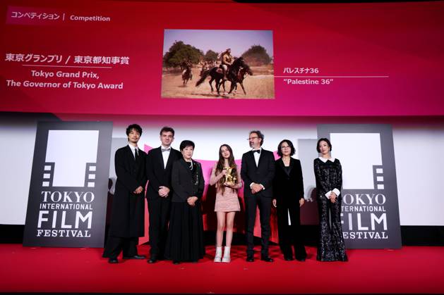 Takumi Saito, Matthieu Laclau, Yuriko Koike, Wardi Eilabouni, Carlo Chatrian, Vivian Qu, Gwey Lun-Mei, November 05, 2025 - Takumi Saito, Matthieu Laclau, Yuriko Koike, Wardi Eilabouni, Carlo Chatrian, Vivian Qu, Gwey Lun-Mei, speak after winning Tokyo Grand Prix The Governor of Tokyo Award for the film Palestine 36 during the 38th Tokyo International Film Festival. award ceremony, in Tokyo, Japan on November 05, 2025. aflo_309478938