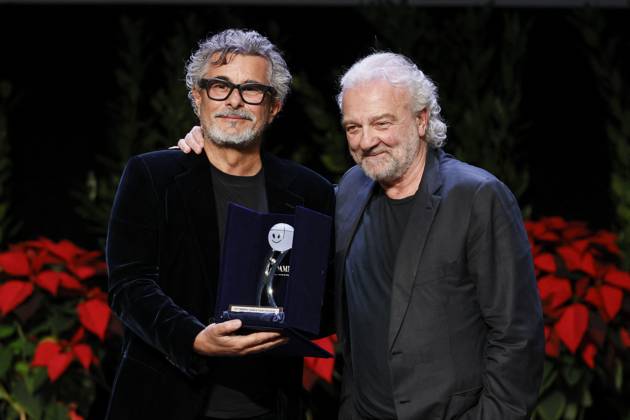 22nd Monte Carlo Film Festival - Awards Gala Night Paolo Genovese receives the Career Award from Giovanni Veronesi and Ezio Greggio the awards gala night held at Grimaldi Forum during 22nd Monte Carlo Film Festival on November 15, 2025 in Monte Carlo, Monaco. Photo Marco Piovanotto ABACAPRESS.COM Monte Carlo Monaco  Copyright: xPiovanottoxMarco ABACAx