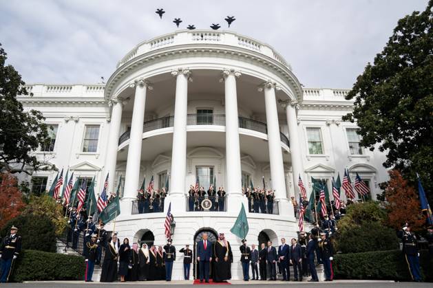 President Donald Trump and Saudi Arabia s Crown Prince Mohammed bin Salman watch as military fighter jets perform a flyover during a welcoming ceremony at the White House in Washington DC on Tuesday, November 18. 2025. The two leaders are expected to discuss defense, nuclear power, technology, and Israel during the visit.  WAX20251118843 NATHANxHOWARD