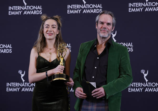 Adriana Timco (L) and Colin Barr arrive in the press room with the Best Documentary award for Hell Jumper at the 53rd International Emmy Awards at New York Hilton Midtown in New York City on Monday, November 24, 2025.  NYP20251124256 JohnxAngelillo