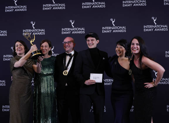 German director Ralf Kukula (3L) and his team arrive in the press room with the International award for Auf Fritzis Spuren Wie war das so in der DDR at the 53rd International Emmy Awards at New York Hilton Midtown in New York City on Monday, November 24, 2025.  NYP20251124267 JohnxAngelillo