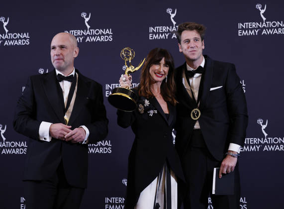 Spanish director Joanna Pardos Servulo (L) and producer Javier Martinez Suarez arrive in the press room with the Sports Documentary award for It s All Over: The Kiss That Changed Spanish Football at the 53rd International Emmy Awards at New York Hilton Midtown in New York City on Monday, November 24, 2025.  NYP20251124271 JohnxAngelillo