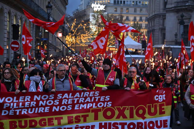 French CGT protest in Paris to maintain the social benefits PARIS, FRANCE - DECEMBER 03: Members of the French General Confederation of Labour (Confederation generale du travail, CGT) march with torchlight to protest against the austerity and inequality, calling for better work conditions and higher salaries in Paris, France on December 03, 2025. Mustafa Yalcin Anadolu Paris France. Editorial use only. Please get in touch for any other usage.  Copyright: x2025xAnadoluxMustafaxYalcinx