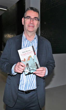 Milan, Italy Mick Herron receives the Raymond Chandler Award at the Noir in Festival with a masterclass at IULM. In the photo: Mick Herron with his book presented at the Noir in Festival.  Copyright: xNickxZonnax xipa-agency.netx xNickxZonnax IPA_Agency_IPA68737788