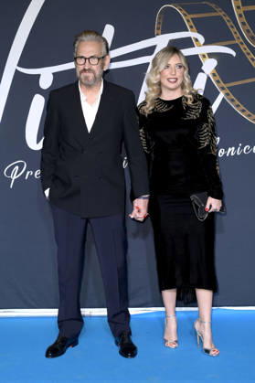 Marco Giallini mit Partnerin Giorgia Battisti bei der Preisverleihung Il Vitti 2025 im Centro Congressi Roma La Nuvola. Rom, 14.12.2025