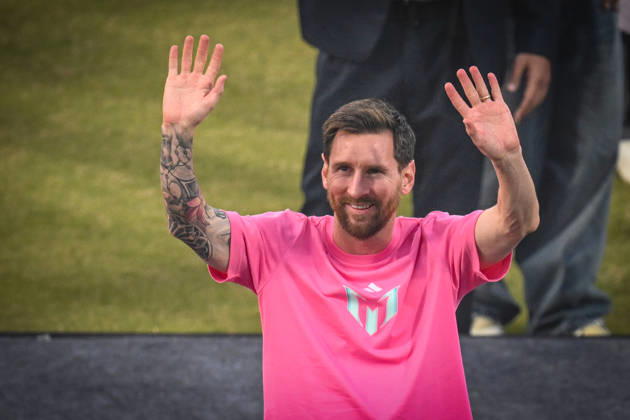 NEW DELHI, INDIA - DECEMBER 15: Lionel Messi, Argentine footballer greets his fans during GOAT India Tour at Arun Jaitley Stadium on December 15, 2025 in New Delhi, India. Lionel Messi concluded his GOAT India Tour in Delhi, a stark contrast to its chaotic Kolkata start. Fans at Arun Jaitley Stadium cheered as the football icon expressed gratitude for the overwhelming affection shown during his brief but memorable visit. Messi promised a return, leaving a lasting impression on his admirers. (Photo by Sanchit Khanna Hindustan Times) GOAT Tour Of India Lionel Messi Felicitated At Arun Jaitley Stadium Delhi