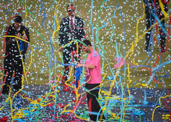 NEW DELHI, INDIA - DECEMBER 15: Lionel Messi, Argentine footballer greets his fans during GOAT India Tour at Arun Jaitley Stadium on December 15, 2025 in New Delhi, India. Lionel Messi concluded his GOAT India Tour in Delhi, a stark contrast to its chaotic Kolkata start. Fans at Arun Jaitley Stadium cheered as the football icon expressed gratitude for the overwhelming affection shown during his brief but memorable visit. Messi promised a return, leaving a lasting impression on his admirers. (Photo by Sanchit Khanna Hindustan Times) GOAT Tour Of India Lionel Messi Felicitated At Arun Jaitley Stadium Delhi