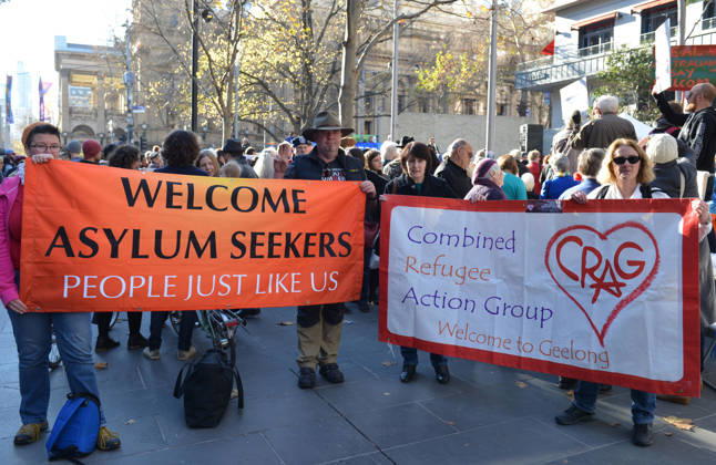 World Refugee Day in Melbourne MELBOURNE, AUSTRALIA - JUNE 21: People hold banners as they gather to mark World Refugee Day in Melbourne, Australia on June 21, 2015. Queensland Australia. Editorial use only. Please get in touch for any other usage.  Copyright: x2025xAnadoluxRecepxÅžakarx