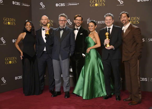 Frida Perez, Evan Goldberg, Seth Rogen, Peter Huyck, Chase Sui Wonders, Alex Gregory and James Weaver appear backstage after winning the award for Best Television Series - Musical or Comedy award for The Studio during the 83rd annual Golden Globe Awards at the Beverly Hilton in Beverly Hills, California on Sunday, January 11, 2026.  LAP20260111279 JIMxRUYMEN