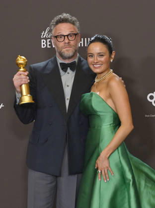 Seth Rogen and Chase Sui Wonders appear backstage after winning the award for Best Television Series - Musical or Comedy award for The Studio during the 83rd annual Golden Globe Awards at the Beverly Hilton in Beverly Hills, California on Sunday, January 11, 2026.  LAP20260111291 JIMxRUYMEN
