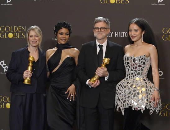 Sara Murphy, Teyana Taylor, Paul Thomas Anderson, and Chase Infiniti appear backstage after winning the award for Best Motion Picture - Musical or Comedy award for One Battle After Another during the 83rd annual Golden Globe Awards at the Beverly Hilton in Beverly Hills, California on Sunday, January 11, 2026.  LAP20260111715 JIMxRUYMEN
