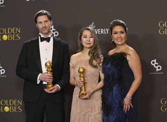 Chris Appelhans, Maggie Kang, and Michelle Wong appear backstage after winning the award for Best Motion Picture - Animated award for KPop Demon Hunters during the 83rd annual Golden Globe Awards at the Beverly Hilton in Beverly Hills, California on Sunday, January 11, 2026.  LAP20260111725 JIMxRUYMEN