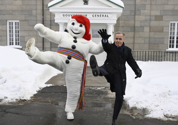 January 22, 2026, Quebec, Pq, Canada: Prime Minister Mark Carney, right, and Bonhomme Carnaval raise their legs together in a traditional carnival kick, at the beginning of a Cabinet planning forum at the Citadelle in Quebec City, Thursday, Jan. 22, 2026. Quebec Canada - ZUMAc35_ 20260122_zaf_c35_018 Copyright: xJacquesxBoissinotx