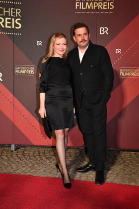 Sebastian Bezzel mit Ehefrau Johanna Christine Gehlen 47. Bayerischer Filmpreis Preis, Auszeichnung Prinzregententheater München 23. Januar 2026