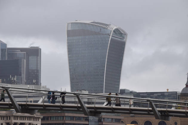 February 12, 2026, London, United Kingdom: People walk across Millennium Bridge past the Walkie-Talkie building as official data shows that the UK economy grew by only 0.1 percent in the last three months of 2025. London United Kingdom - ZUMAs197 20260212_aab_s197_001 Copyright: xVukxValcicx
