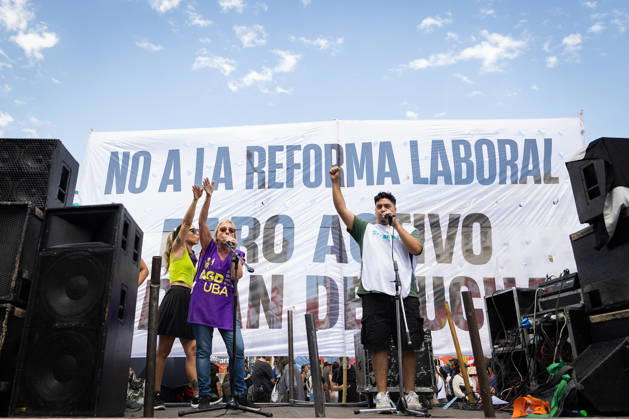 February 11, 2026, Buenos Aires, Buenos Aires, Argentina: Union leaders sing on stage during the march against labor reform outside the National Congress Buenos Aires Argentina - ZUMAp265 20260211_zip_p265_006 Copyright: xDelfinaxCorberaxPix