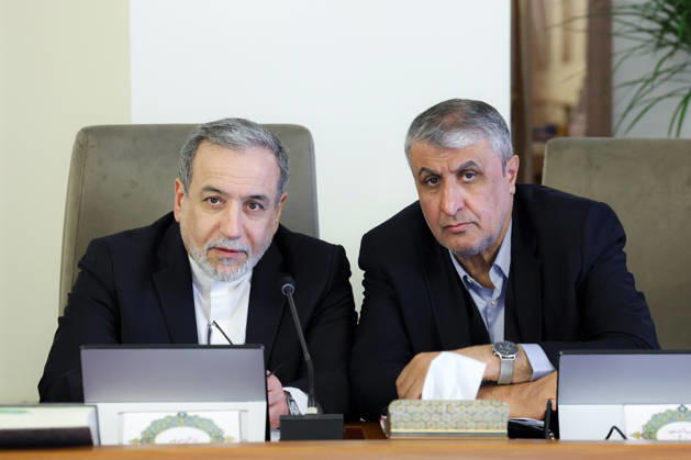 February 18, 2026, Tehran, Iran: Iranian Foreign Minister ABBAS ARAGHCHI (L) and the head of the Atomic Energy Organization of Iran (AEOI) MOHAMMAD ESLAMI attend a government meeting in Tehran. Tehran Iran - ZUMAi98_ 20260218_zih_i98_008 Copyright: xIranianxPresidencyx