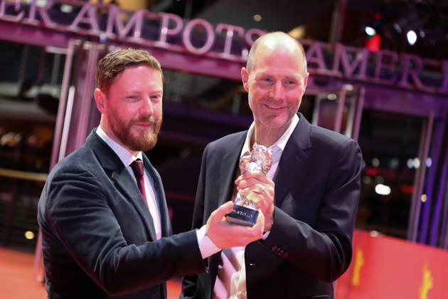 February 21, 2026, Berlin, Germany: Tristan Goligher (L) and Lance Hammer pose with the Silver Bear Jury Prize for Queen at Sea after the closing ceremony of the 76th Berlin International Film Festival (Berlinale), Europe s first major film festival of the year, in Berlin. The festival runs from February 12 to 22, 2026. Berlin Germany - ZUMAf146 20260221_zip_f146_036 Copyright: xRouzbehxFouladix