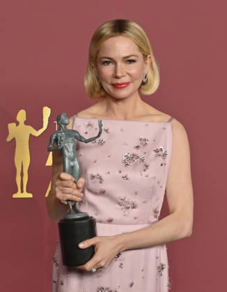 Michelle Williams, winner of the Outstanding Performance by a Female Actor in a Television Movie or Limited Series award for Dying For Sex appears backstage during the 32nd annual SAG Awards held at the Shrine Auditorium in Los Angeles on Sunday, March 1, 2026.  LAP20260301751 JIMxRUYMEN