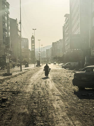 (260306) -- BEIRUT, March 6, 2026 -- A pedestrian walks on a street full of debris after an Israeli airstrike in Beirut s southern suburbs, Lebanon, March 6, 2026. Dozens of Israeli airstrikes targeted areas across Lebanon overnight and early Friday, striking Beirut s southern suburbs, southern Lebanon and the Bekaa Valley amid escalating military tensions. (Photo by Xinhua) LEBANON-BEIRUT-ISRAELI AIRSTRIKE BilalxJawich 