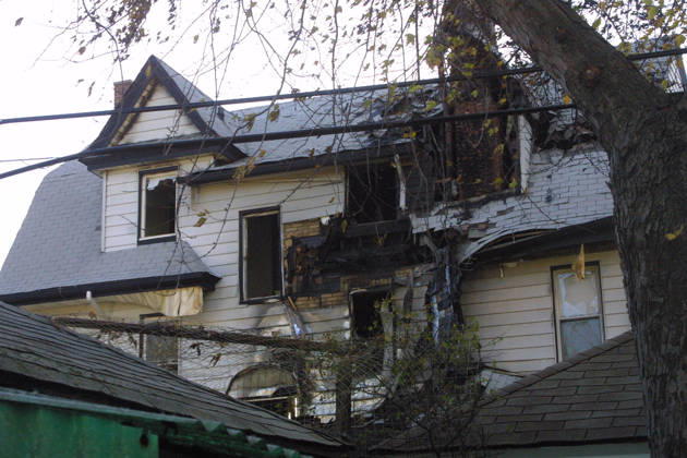 American Airlines Fight 587 Crashes in NYC Nov 12, 2001; Queens, NY, USA; A view of a burnt apartment building in Belle Harbor, Queens which was hit by American Airlines Flight 587 which departed JFK Airport.. Copyright: xNancyxKaszermanx