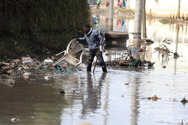 Torrential rains cause deadly flooding in Kenya NAIROBI, KENYA - MARCH 9: A man walks through accumulated floodwaters as several streets in the capital are affected in Nairobi, Kenya, on March 9, 2026. The death toll from floods caused by heavy rains has risen to 42. Lucas Mukasa Anadolu Nairobi Kenya. Editorial use only. Please get in touch for any other usage.  Copyright: x2026xAnadoluxLucasxMukasax