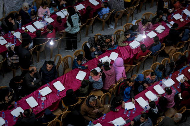 Mass iftar held for displaced Palestinians in Gaza GAZA CITY, GAZA – MARCH 10: Palestinians gather to break their fast during a communal iftar organized by a charity organization in the Sheikh Radwan neighborhood of Gaza City, which was devastated by Israeli attacks, on March 10, 2026. Saeed M. M. T. Jaras Anadolu Gaza City Gaza. Editorial use only. Please get in touch for any other usage.  Copyright: x2026xAnadoluxSaeedxM.xM.xT.xJarasx