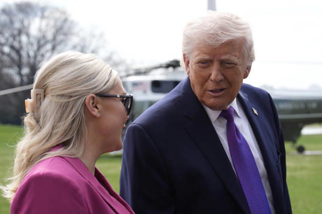 Donald Trump deparst to Kentucky - Washington US President Donald Trump with White House Press Secretary Karoline Leavitt speaks to the members of the media on the South Lawn of the White House in Washington before boarding Marine One helicopter en route en route Hebron, Kentucky on March 11, 2026. Photo by Yuri Gripas ABACAPRESS.COM Washington DC United States  Copyright: xPool ABACAx