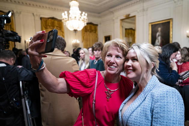 Trump Hosts Women s History Month Event Karoline Leavitt, White House press secretary, poses for a selfie photograph with an attendee during a Women s History Month event in the East Room of the White House in Washington, DC, USA, on Thursday, March 12, 2026. Every year, March is designated Women s History Month by presidential proclamation. Credit: CNP AdMedia Washington District of Columbia United States of America EDITORIAL USE ONLY  Copyright: xx AD_06_WHwomens CNPx xAdMediax admphotostwo974282