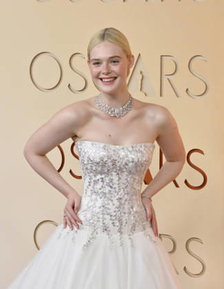 Elle Fanning arrives on the red carpet for the 98th annual Academy Awards in the Hollywood section of Los Angeles on Sunday, March 15, 2026. Conan O Brien will host the Oscars for the second consecutive year. LAP20260315183 JIMxRUYMEN