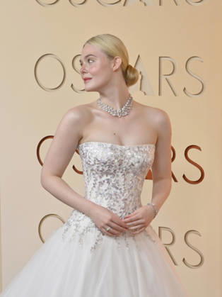 Elle Fanning arrives on the red carpet for the 98th annual Academy Awards in the Hollywood section of Los Angeles on Sunday, March 15, 2026. Conan O Brien will host the Oscars for the second consecutive year. LAP20260315185 JIMxRUYMEN