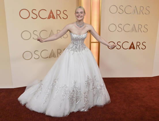 Elle Fanning arrives on the red carpet for the 98th annual Academy Awards in the Hollywood section of Los Angeles on Sunday, March 15, 2026. Conan O Brien will host the Oscars for the second consecutive year. LAP20260315187 JIMxRUYMEN