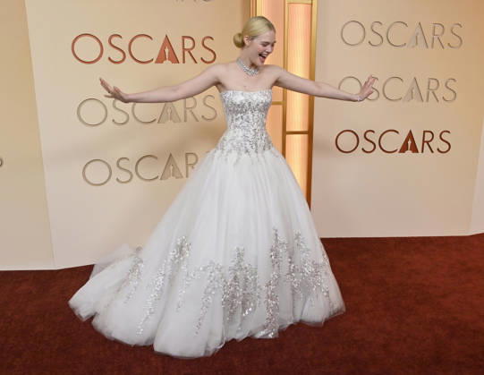 Elle Fanning arrives on the red carpet for the 98th annual Academy Awards in the Hollywood section of Los Angeles on Sunday, March 15, 2026. Conan O Brien will host the Oscars for the second consecutive year. LAP20260315188 JIMxRUYMEN