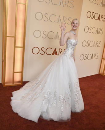 Elle Fanning arrives on the red carpet for the 98th annual Academy Awards in the Hollywood section of Los Angeles on Sunday, March 15, 2026. Conan O Brien will host the Oscars for the second consecutive year. LAP20260315192 JIMxRUYMEN