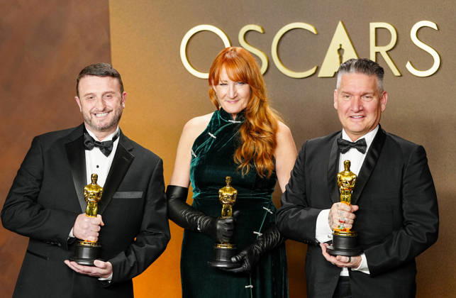 Mike Hill, Cliona Furey, and Jordan Samuel celebrate in the press photo room after winning the Makeup and Hairstyling Oscar for Frankenstein during the 98th annual Academy Awards in the Hollywood section of Los Angeles on Sunday, March 15, 2026. Conan O Brien is hosting the Oscars for the second consecutive year. LAP20260315336 BONNIExCASH