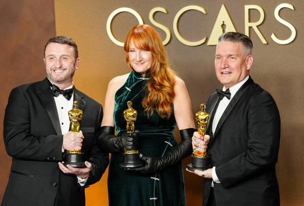 Mike Hill, Cliona Furey, and Jordan Samuel celebrate in the press photo room after winning the Makeup and Hairstyling Oscar for Frankenstein during the 98th annual Academy Awards in the Hollywood section of Los Angeles on Sunday, March 15, 2026. Conan O Brien is hosting the Oscars for the second consecutive year. LAP20260315337 BONNIExCASH