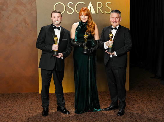 Mike Hill, Cliona Furey, and Jordan Samuel celebrate in the press photo room after winning the Makeup and Hairstyling Oscar for Frankenstein during the 98th annual Academy Awards in the Hollywood section of Los Angeles on Sunday, March 15, 2026. Conan O Brien is hosting the Oscars for the second consecutive year. LAP20260315339 BONNIExCASH