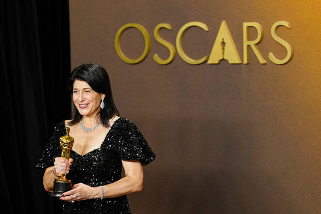Cassandra Kulukundis celebrates in the press photo room after winning the Best Casting Oscar for One Battle After Another during the 98th annual Academy Awards in the Hollywood section of Los Angeles on Sunday, March 15, 2026. Conan O Brien is hosting the Oscars for the second consecutive year. LAP20260315331 BONNIExCASH