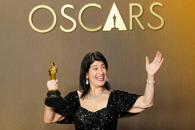Cassandra Kulukundis celebrates in the press photo room after winning the Best Casting Oscar for One Battle After Another during the 98th annual Academy Awards in the Hollywood section of Los Angeles on Sunday, March 15, 2026. Conan O Brien is hosting the Oscars for the second consecutive year. LAP20260315333 BONNIExCASH