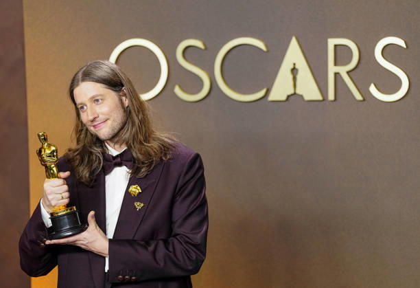 Best Original Score Oscar winner Ludwig Goransson of Sinners celebrates in the press photo room during the 98th annual Academy Awards in the Hollywood section of Los Angeles on Sunday, March 15, 2026. LAP2026031542755 BONNIExCASH