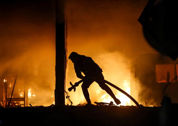 Israeli military carried out an airstrike on Gaza GAZA CITY, GAZA - MARCH 22: Civil defense teams fight the fire that broke out in the building following the Israeli attack in Gaza City, Gaza on March 22, 2026. Saeed M. M. T. Jaras Anadolu Gaza City Gaza. Editorial use only. Please get in touch for any other usage.  Copyright: x2026xAnadoluxSaeedxM.xM.xT.xJarasx