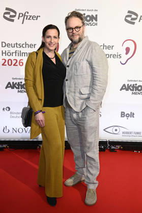 Ulrike Frank mit Ehemann Marc Schubring bei der Verleihung des 24. Deutschen Hörfilmpreises 2026 im Colosseum Filmtheater. Berlin, 24.03.2026